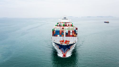 cargo-container-ship-sailing-sea-import-export-business-industry-logistic-goods (1)